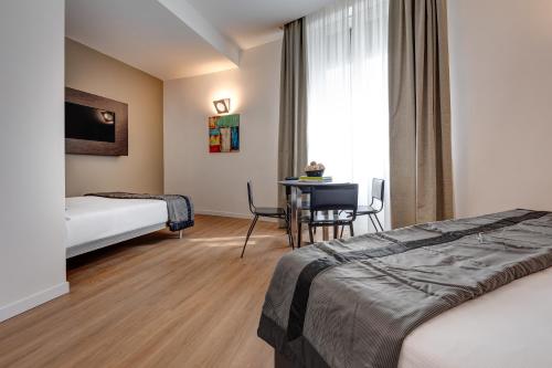 Habitación cuádruple del hotel Rome Art. Foto 2