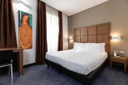 Habitación Triple del hotel Rome Art. Foto 2