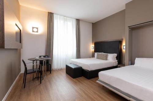 Habitación Cuádruple del hotel Rome Art. Foto 4