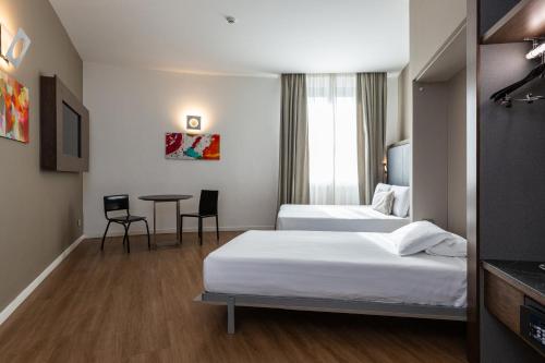Habitación Cuádruple del hotel Rome Art. Foto 6