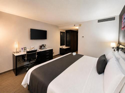 Habitación Superior con cama extragrande del hotel Laila Mexico City Reforma. Foto 6
