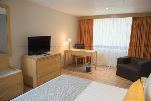 Habitación con cama extragrande del hotel Sevilla Palace. Foto 4