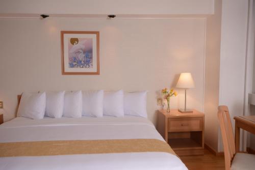 Habitación Estándar - Cama extragrande del hotel Pf. Foto 2