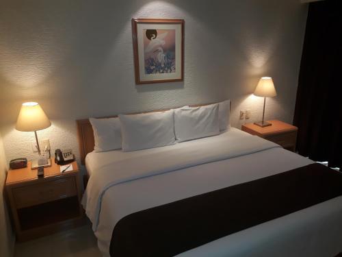 Habitación Estándar - Cama extragrande del hotel Pf. Foto 20