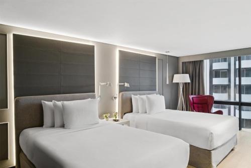 Habitación Premium con 2 camas dobles del hotel Nh Collection Mexico City Reforma. Foto 1