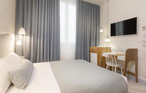 Habitación Individual Clásica - Cama grande del hotel Lapin Blanc. Foto 1