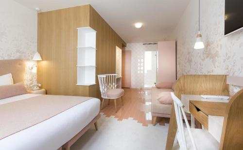 Habitación Triple Deluxe del hotel Lapin Blanc