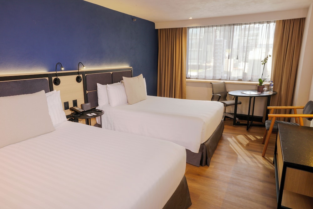 Signature Double Room del hotel Galeria Plaza Reforma. Foto 1