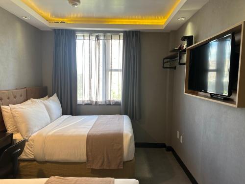 Habitación Doble del hotel Madison LES. Foto 1