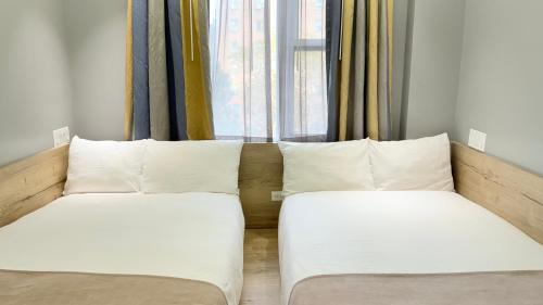 Habitación Doble Deluxe del hotel Madison LES. Foto 3