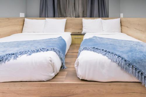 Habitación Doble Deluxe del hotel Madison LES. Foto 6