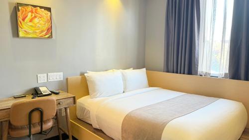 Habitación Deluxe - 1 cama grande del hotel Madison LES. Foto 2