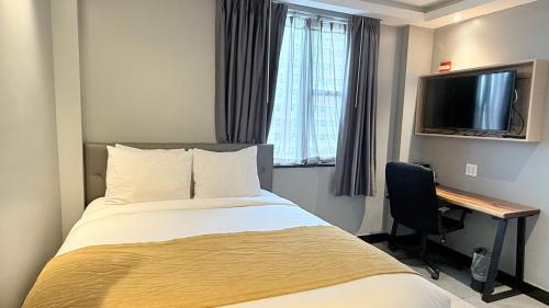 Habitación Estándar - 1 cama grande del hotel Madison LES. Foto 1