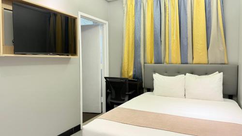 Habitación Estándar - 1 cama grande del hotel Madison LES. Foto 5