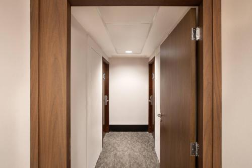 Habitación Deluxe comunicada del hotel Melia Paulista. Foto 1