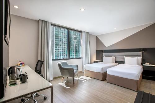 Habitación Doble Deluxe - 2 camas del hotel Melia Paulista. Foto 4