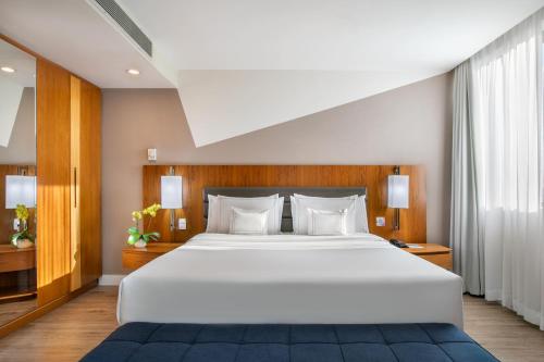 Suite Junior Executive con cama grande del hotel Melia Paulista. Foto 1