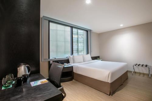 Habitación Deluxe adaptada para personas de movilidad reducida con 1 cama grande del hotel Melia Paulista. Foto 2