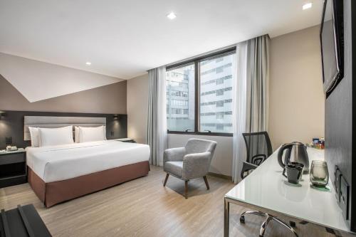 Habitación Deluxe con cama grande del hotel Melia Paulista. Foto 2