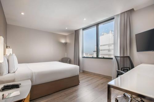 Habitación Premium con cama grande del hotel Melia Paulista. Foto 4