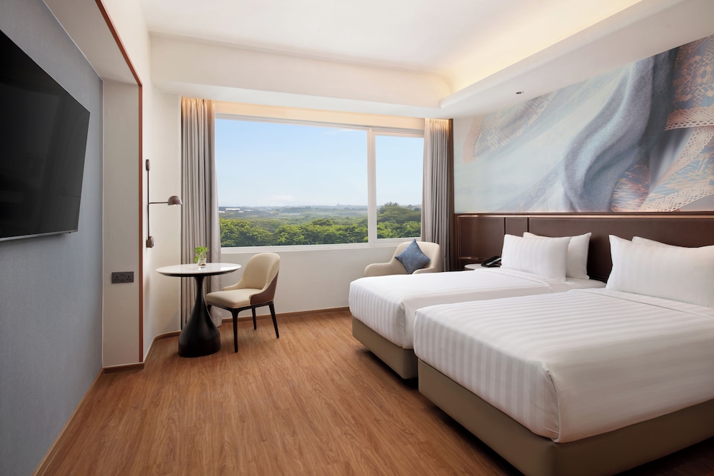 Habitación Superior - 2 camas individuales del hotel Mercure Serpong Alam Sutera. Foto 6