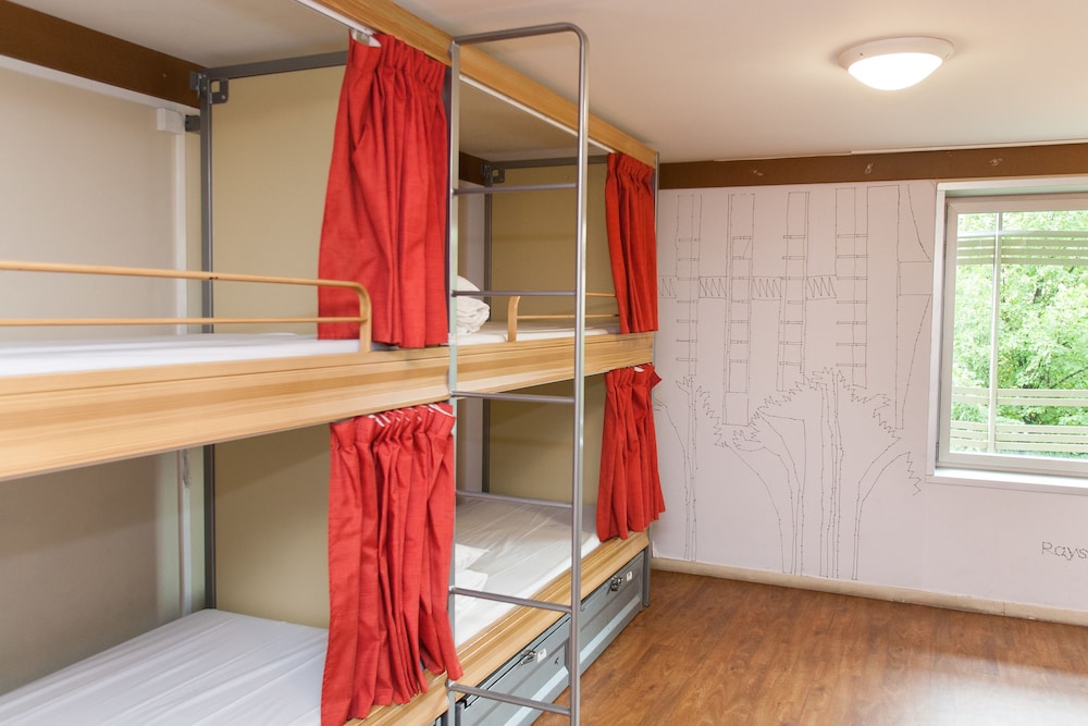 Dormitorio compartido, dormitorio mixto, baño compartido (8 Bed Dorm) del hotel St Christopher's Inns The Canal. Foto 1