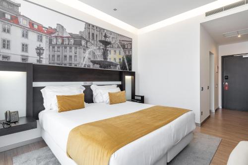 Habitación Doble Estándar - 1 o 2 camas del hotel Jupiter Lisboa – Rooftop and Spa. Foto 2