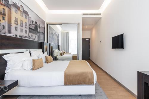 Habitación Doble Superior del hotel Jupiter Lisboa – Rooftop and Spa
