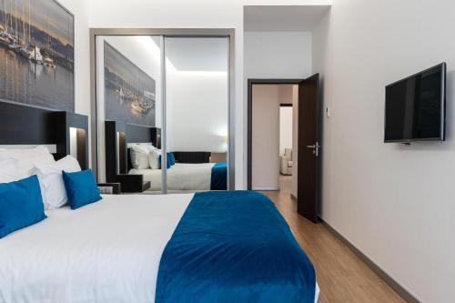 Suite Junior Familiar del hotel Jupiter Lisboa – Rooftop and Spa. Foto 1