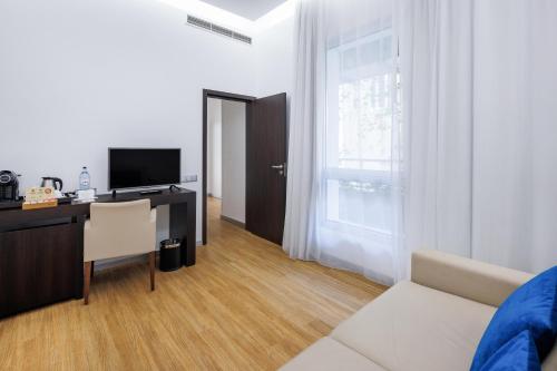 Suite Junior Familiar del hotel Jupiter Lisboa – Rooftop and Spa. Foto 4