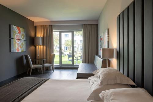 Habitación Familiar con balcón del hotel Vila Gale Evora. Foto 3