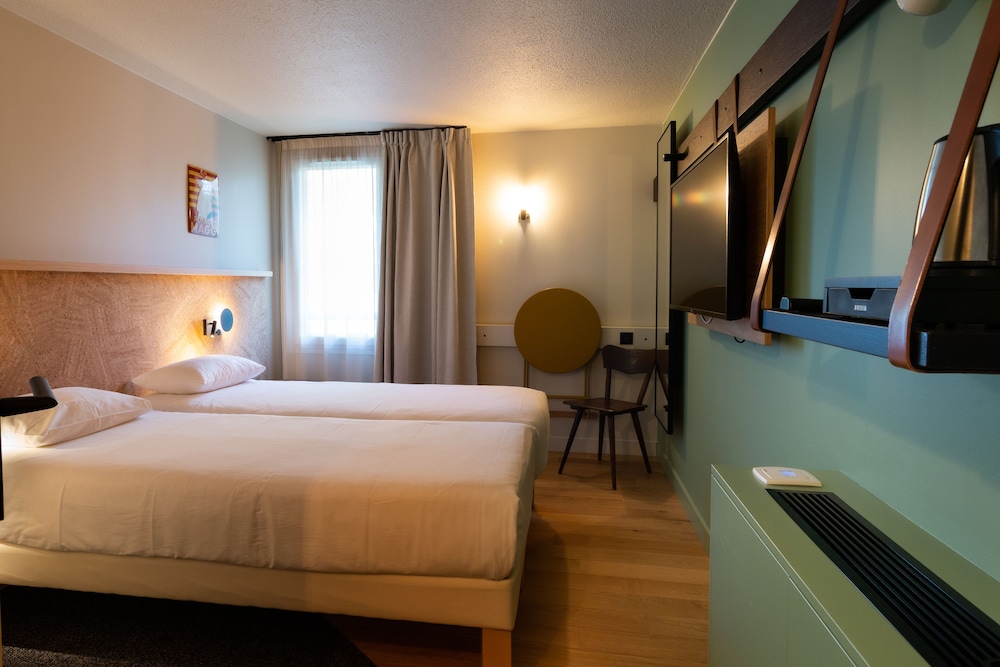 Habitación Pop con 2 camas individuales del hotel Greet Colmar. Foto 1