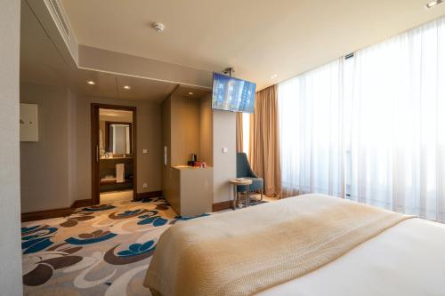 Habitación con terraza - Azotea del hotel Smy Lisboa. Foto 4