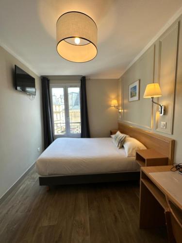 Habitación Doble con baño compartido del hotel Bonséjour Montmartre. Foto 2