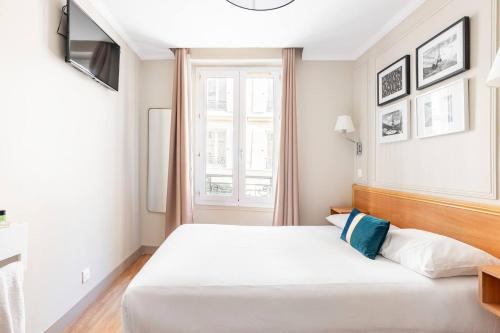 Habitación Doble con baño compartido del hotel Bonséjour Montmartre. Foto 7
