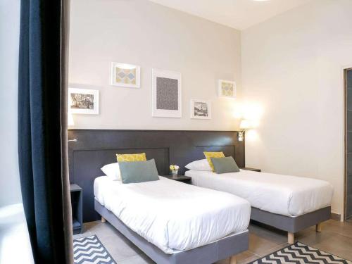 Triple Room with Private Bathroom - Ground Floor del hotel Bonséjour Montmartre. Foto 2