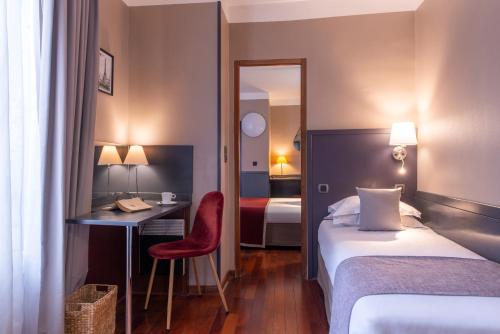 Habitación Triple del hotel George Sand. Foto 6