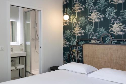 2 habitaciones Dobles Superior comunicadas del hotel Hotel De Suez. Foto 3