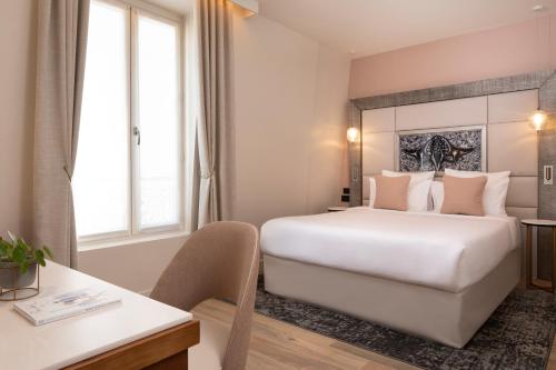 Habitación Executive con vista al patio del hotel Hôtel des Champs-Elysées. Foto 9