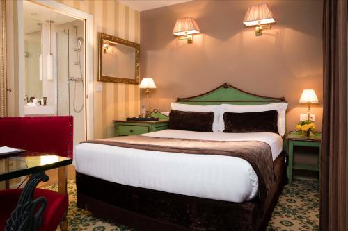 Habitación Clásica del hotel Hotel Des Deux Continents. Foto 1