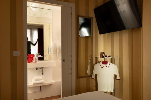 Habitación Individual del hotel Hotel Des Deux Continents. Foto 1