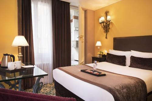 Habitación Cosy del hotel Hotel Des Deux Continents. Foto 4