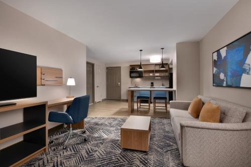 Habitación de 1 dormitorio con bañera adaptada para personas con movilidad reducida - No fumadores - 1 cama grande del hotel CANDLEWOOD SUITES SYRACUSE-AIRPORT