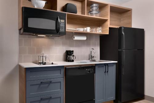Suite Estudio con 2 camas dobles del hotel CANDLEWOOD SUITES SYRACUSE-AIRPORT. Foto 2