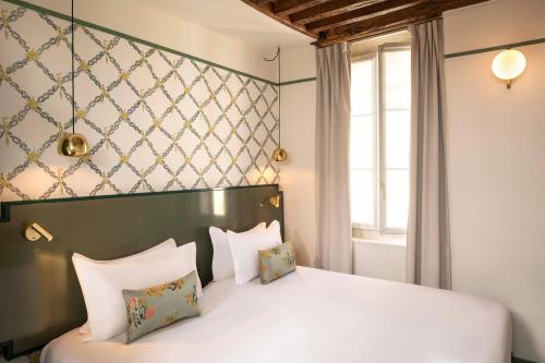 Habitación Individual Estándar del hotel Des Deux-Iles. Foto 2