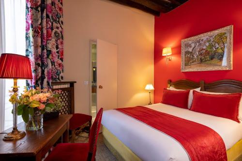Habitación Doble Clásica del hotel Hôtel Des Marronniers. Foto 1