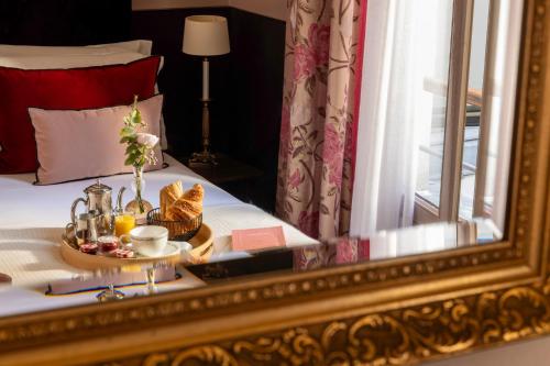 Habitación Doble Clásica del hotel Hôtel Des Marronniers. Foto 5