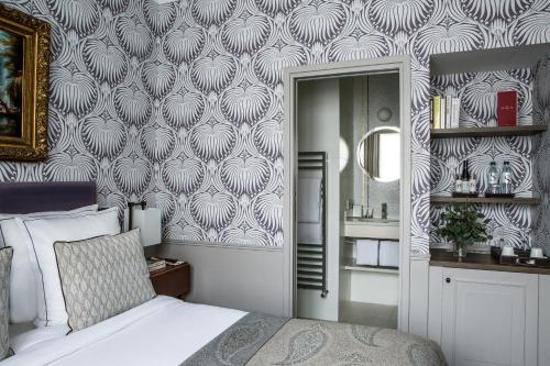 Habitación Clásica del hotel Des Saints Peres. Foto 2