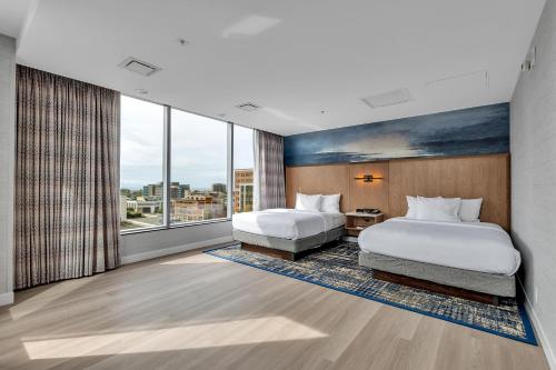 Suite 2 habitaciones Sofá Cama incluido 2 Camas queen Agradable del hotel EMBASSY SUITES BUFFALO. Foto 5