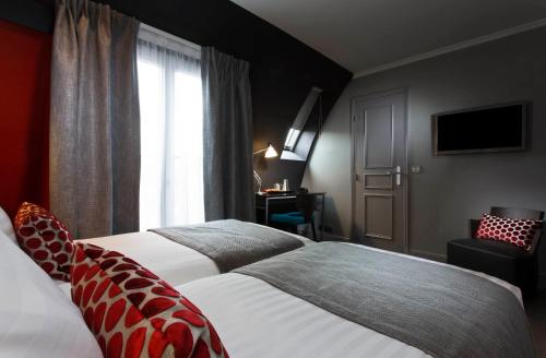 Habitación Triple del hotel Hôtel Garance. Foto 1